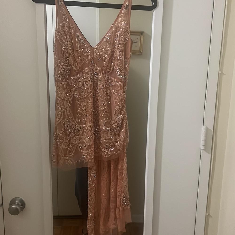 Tracy reese beaded sleeveless draped side beaded top.